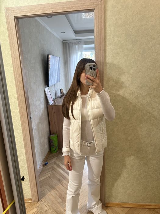 Жіноча осіння жилетка