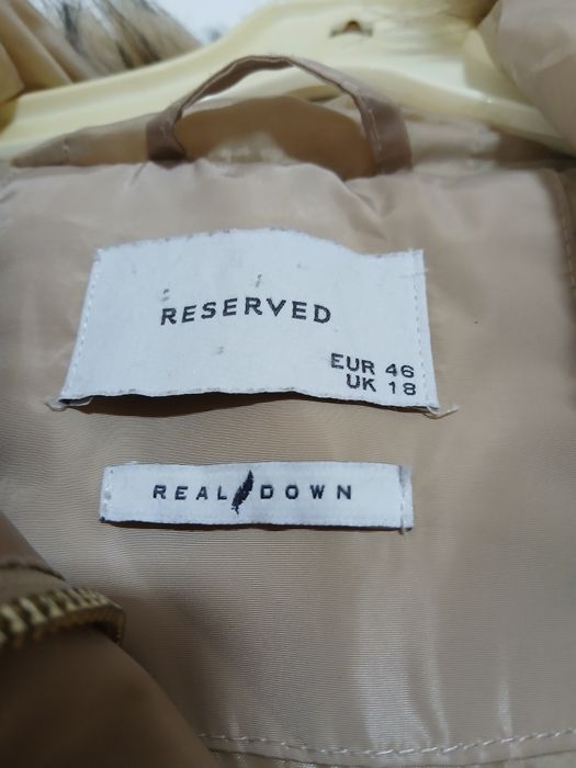 Продам женский зимний пуховик большого размера.