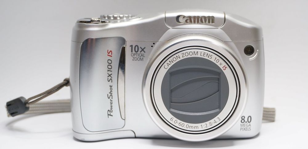 canon powershot sx100 is - купить цифровые фотоаппараты - Цена на