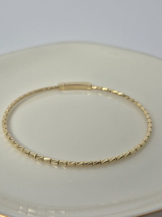 Nowa złota bransoletka bangle sztywna cienka kostki szlifowane 585