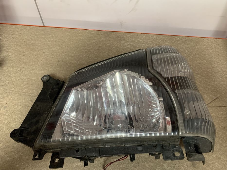 Farol isuzu NPR 2007