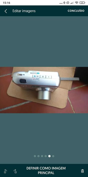 Máquina fotográfica e câmara