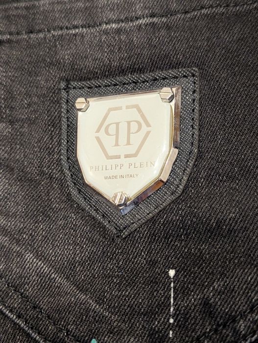 jeansy Philipp Plein, denim z nadrukiem i przetarciami