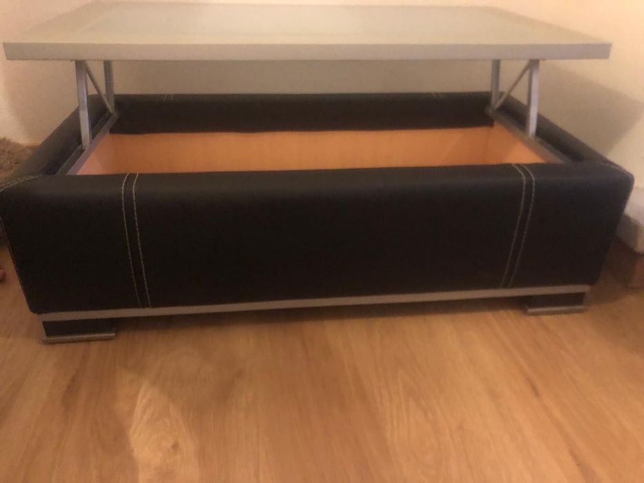 Mesa de centro com tampo elevatório
