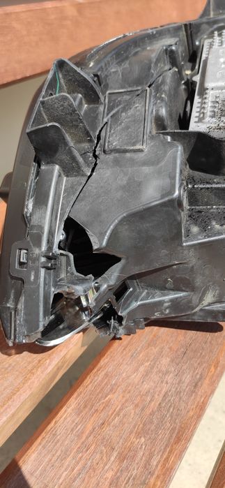 Lewa lampa Ford Fusion HS73-13E015-AF uszkodzona