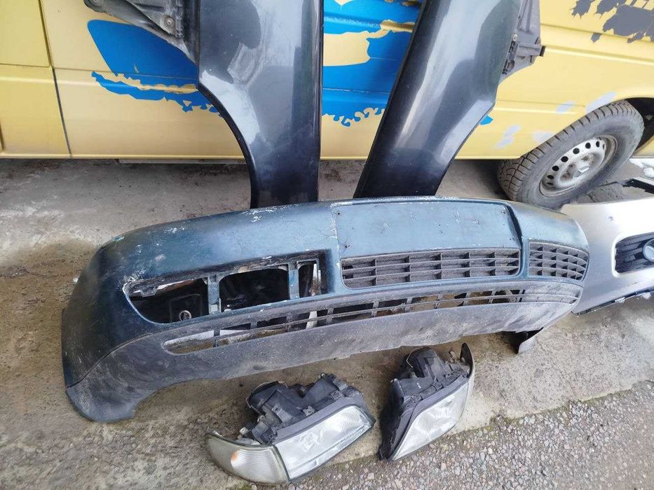 бампер Ауді А6 с4 бампер  передній