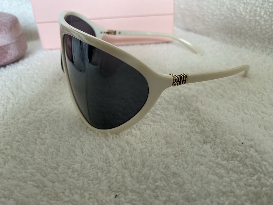 Okulary Miu Miu SMU A01