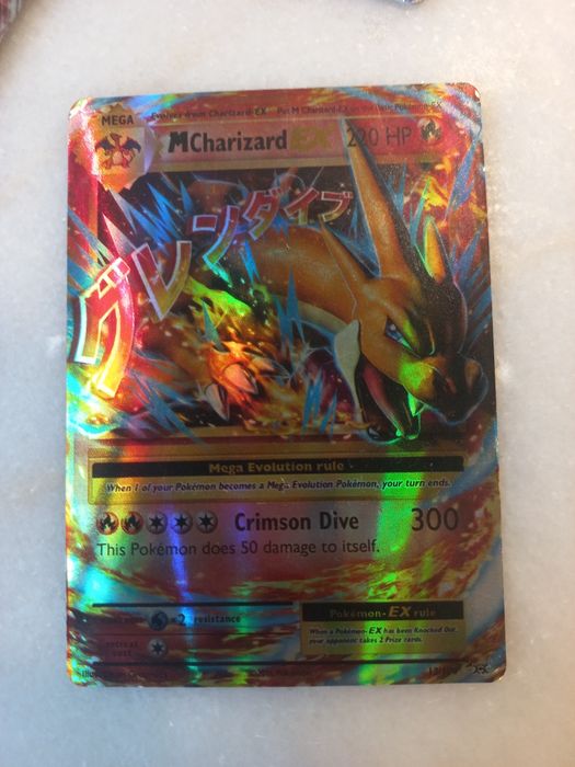 Charizard chinês pokemon