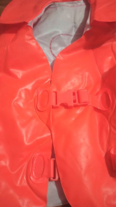 Жилет та нарукавники для плавання