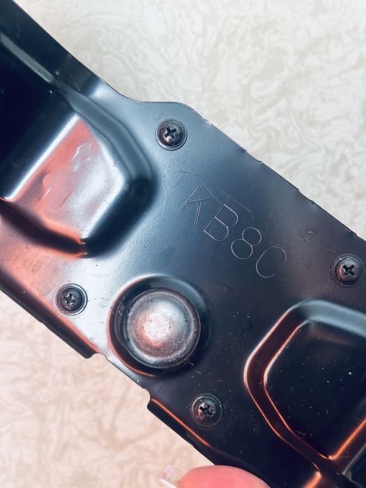 Емблема і радар дістронік на Mazda CX5