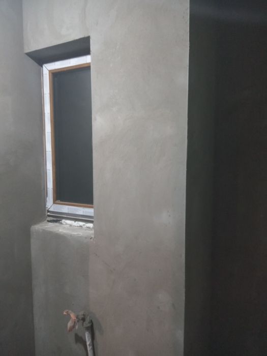 Tynki maszynowe  cementowo- wapienne  posadzki z mixokreta