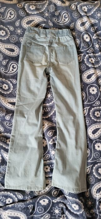 Miękkie jeansy spodnie 134 H&M
