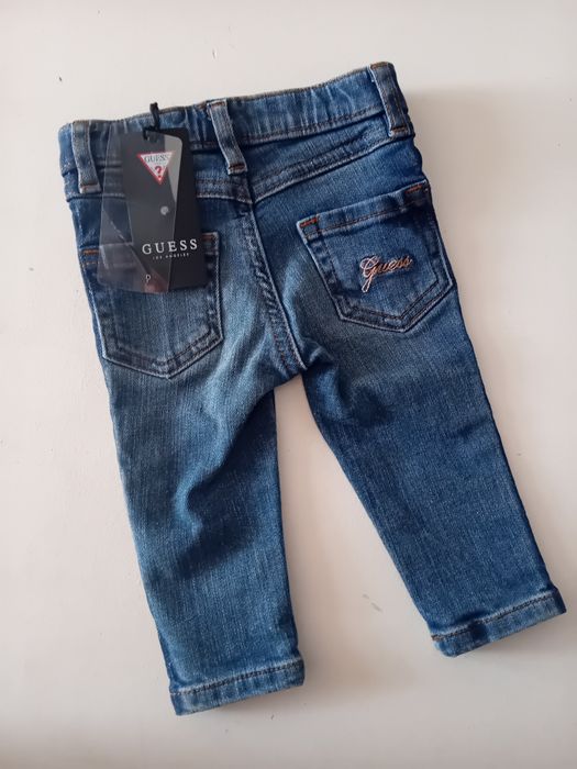 Spodnie jeansy Guess rozmiar 3-6 m-ce granat