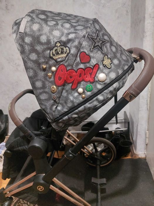 Коляска Cybex Priam Gold Rebellious 2в1