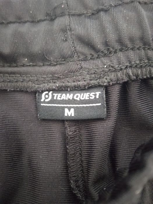Fato de treino da team quest como novo