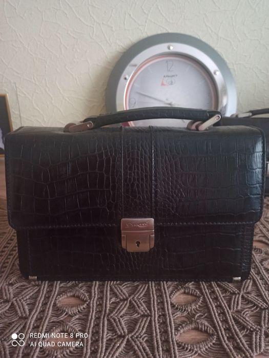 Чоловічі  барсетки  з натуральної шкіри