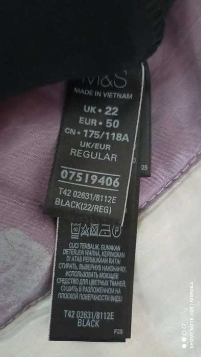 Czarny  długi kombinezon materiałowy szerokie nogawki MarksSpencer