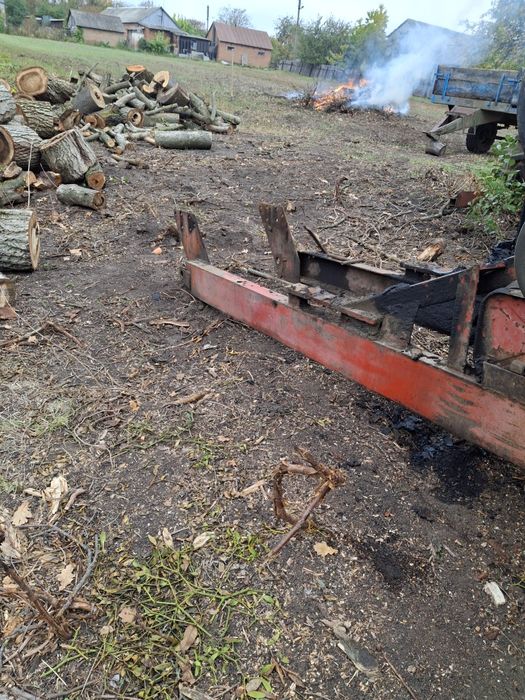 Грейферний погружчик юмз