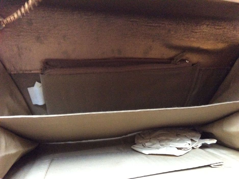 Złota kopertówka na łańcuszku