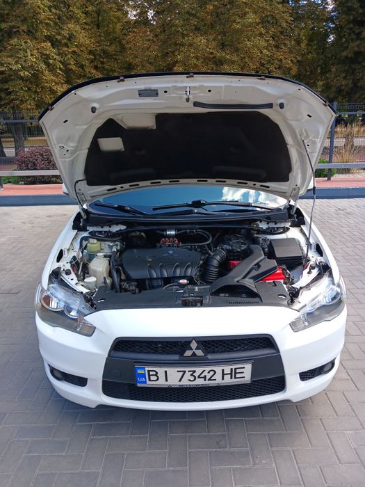Mitsubishi Lancer 2009 VIN JMBLTCX3A9U002885 фото оголошення 15 з 18