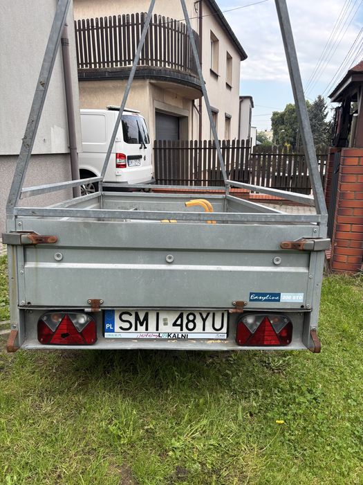 Przyczepka lekka thule baner reklamowy reklama na kółkach