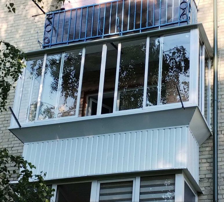 Балкони Вікна Двері