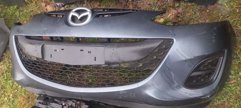 Бампер  радіатори підсилювач телевізор капот крило mazda 2 de lift
