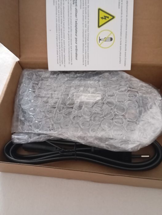 Computer charger

- Includes power cable.64297968496898120