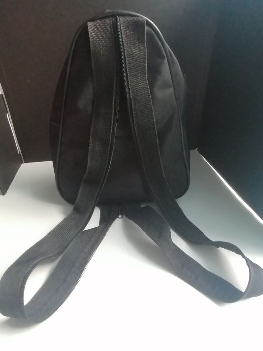 Mochila com publicidade à Coca-Cola