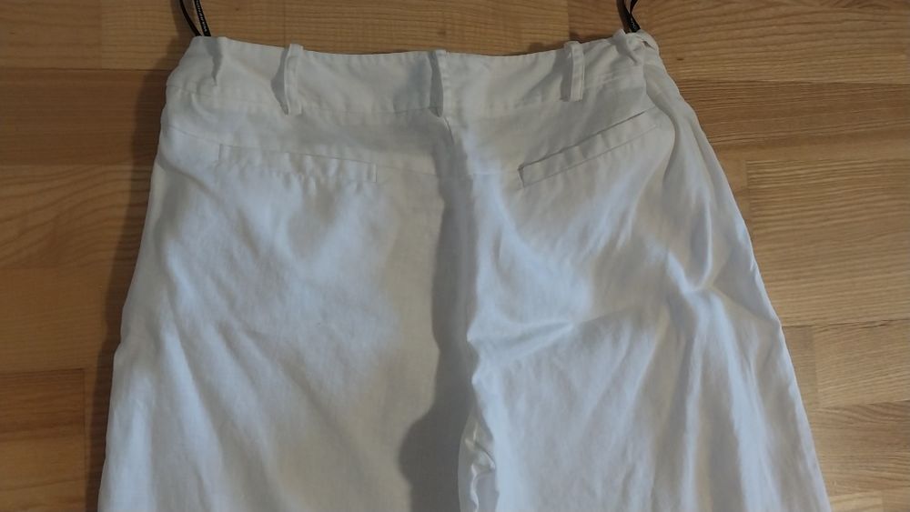Продам  женские белые льняные штаны  Warehouse  оригинальные.