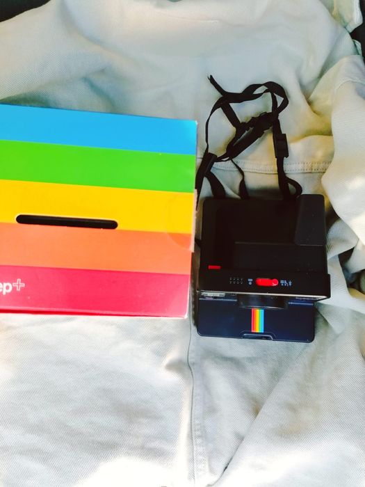 Polaroid Onestep + preta em ótimo estado.