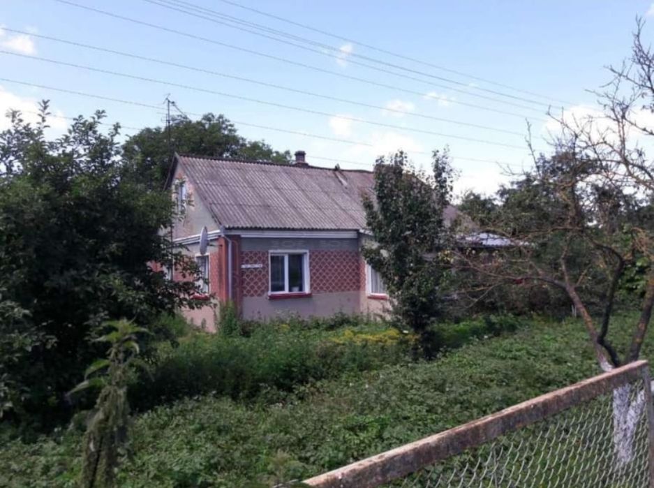 Продаж цегляного будинку.