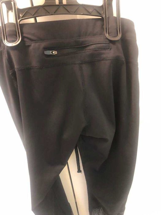 Czarne legginsy asics / S /