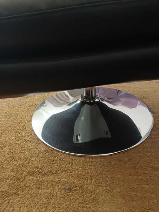 Apoio para pés giratório