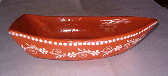 Barco em barro para marisco