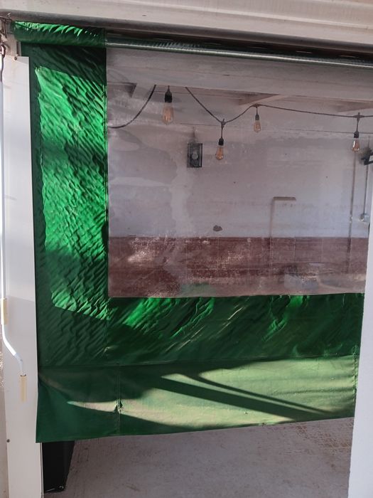 Toldo verde e transparente manual