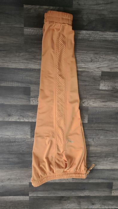 świetne deesowe spodnie PUMA