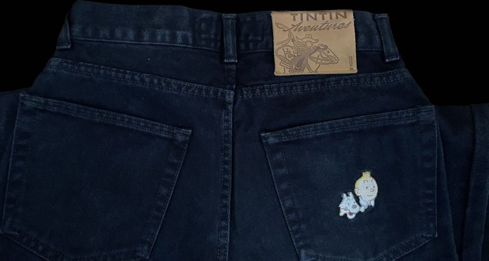 Calças jeans roupa de homem Armani Jeans e Tintim e Milou Aventura