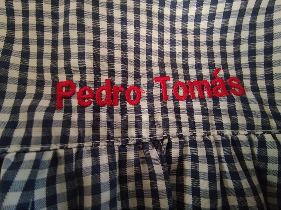 Batas, chapéus e lancheiras bordadas