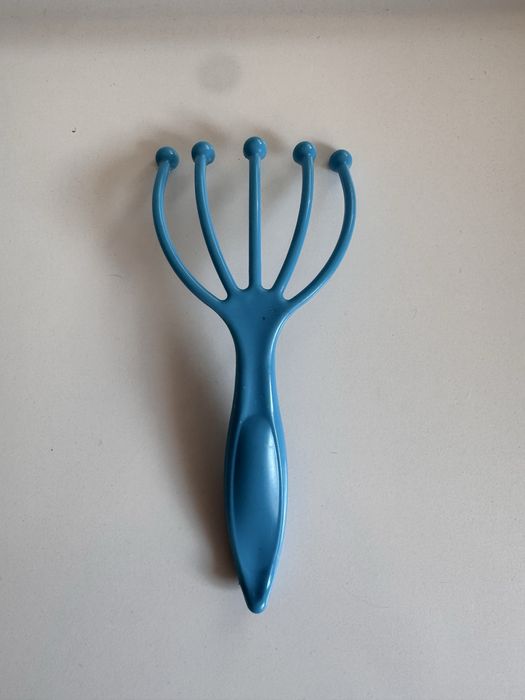 Masażer do skory glowy