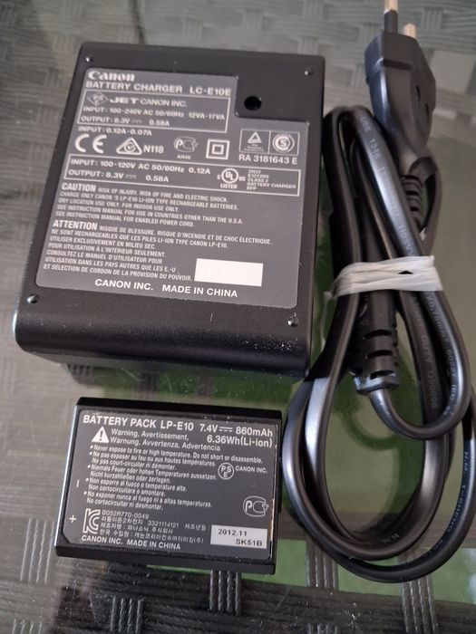 Vendo carregador com bateria da marca Canon.Valor Negociavel.
