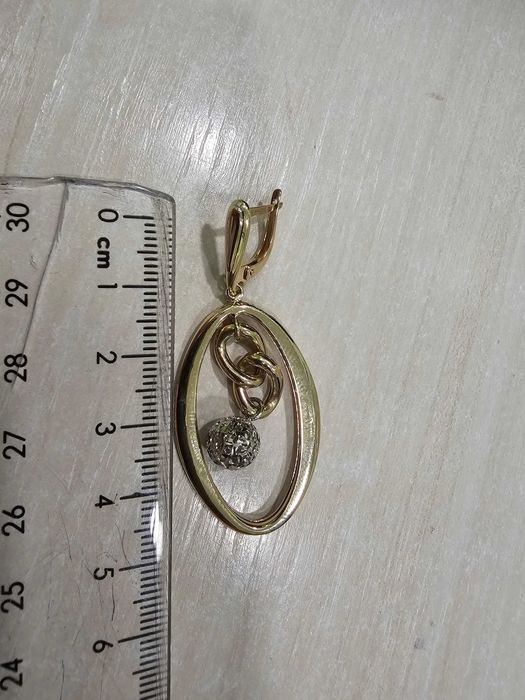 Piękne nietypowe kolczyki owalne z wiszącymi elementami PR 585 5 cm