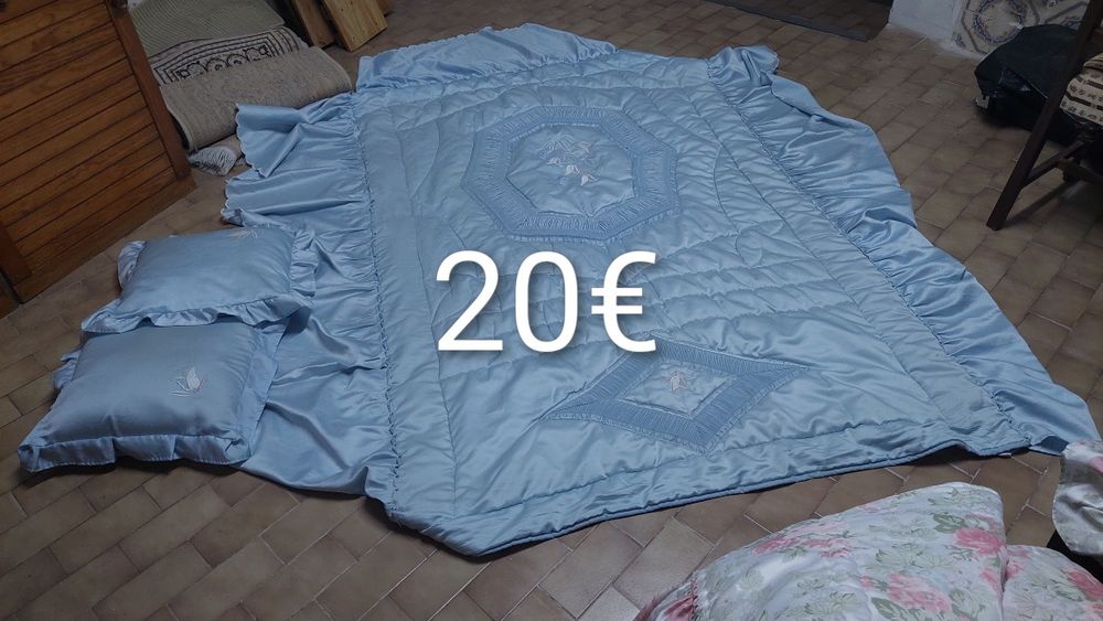 Carpetes / mantas / edredões
