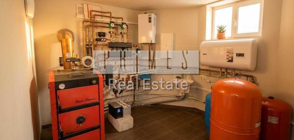 Продаж будинку з ремонтом, ділянка 10 соток, гараж на 2 авто, Гатне