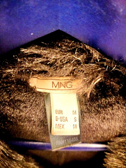 Casacao em pele com pêlo castanho