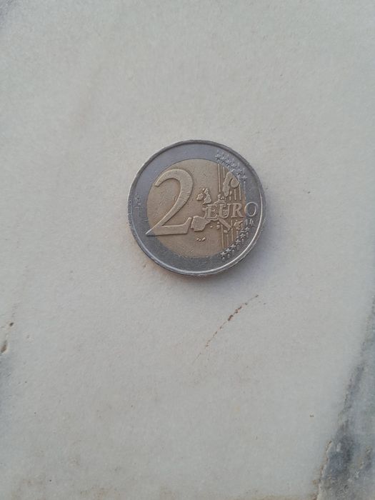 Moeda de 2€ dos Países Baixos, de 2001, com o perfil da Rainha Beatrix
