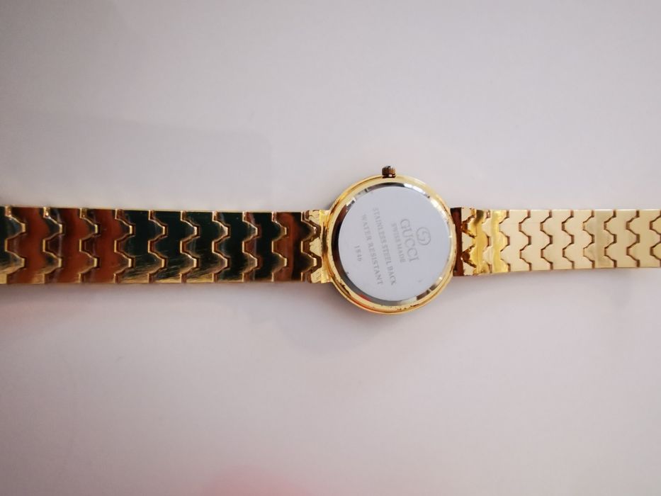 Zegarek złota bransoleta Gucci