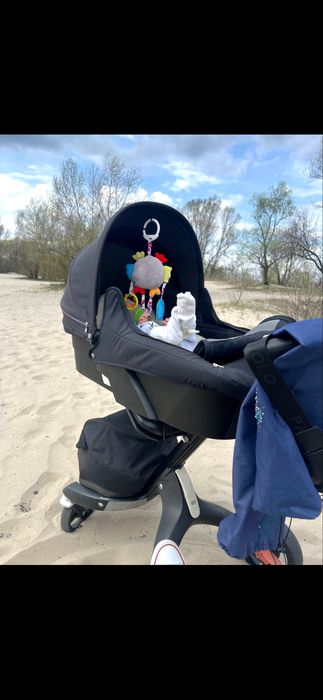 Коляска Stokke Xplory V5 3 в одном в двух цветах черный и розовый