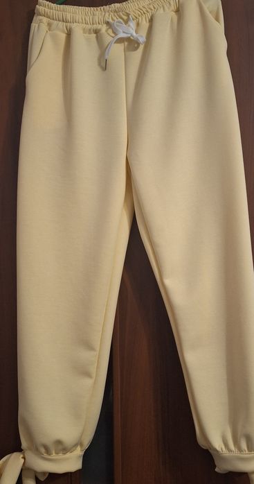 Spodnie żółte nogawki wiązane roz.XL