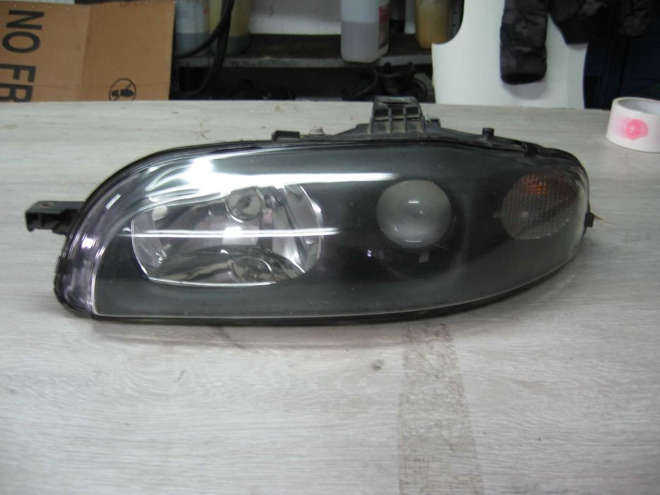 Lampa przednia lewa Marea soczewka